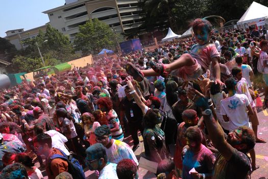 MALAYSIA, Kuala Lumpur: Revellers dance and spray colored powder during the Holi Festival in Kuala Lumpur on March 26, 2016. Holi, also called the Festival of Colours, is a popular Hindu spring festival observed in India, Malaysia and other countries at the end of the winter season on the last full moon day of the lunar month. 