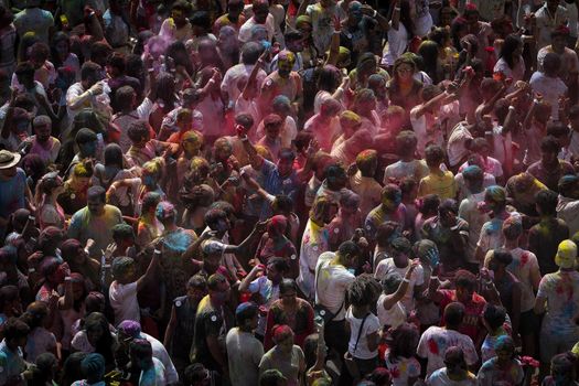 MALAYSIA, Kuala Lumpur: Revellers dance and spray colored powder during the Holi Festival in Kuala Lumpur on March 26, 2016. Holi, also called the Festival of Colours, is a popular Hindu spring festival observed in India, Malaysia and other countries at the end of the winter season on the last full moon day of the lunar month. 