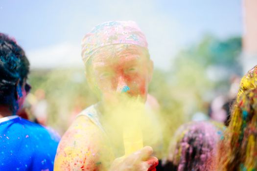 MALAYSIA, Kuala Lumpur: Revellers dance and spray colored powder during the Holi Festival in Kuala Lumpur on March 26, 2016. Holi, also called the Festival of Colours, is a popular Hindu spring festival observed in India, Malaysia and other countries at the end of the winter season on the last full moon day of the lunar month. 