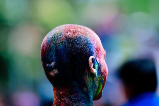 MALAYSIA, Kuala Lumpur: Revellers dance and spray colored powder during the Holi Festival in Kuala Lumpur on March 26, 2016. Holi, also called the Festival of Colours, is a popular Hindu spring festival observed in India, Malaysia and other countries at the end of the winter season on the last full moon day of the lunar month. 