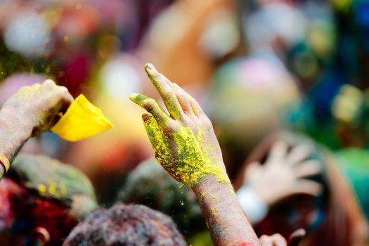 MALAYSIA, Kuala Lumpur: Revellers dance and spray colored powder during the Holi Festival in Kuala Lumpur on March 26, 2016. Holi, also called the Festival of Colours, is a popular Hindu spring festival observed in India, Malaysia and other countries at the end of the winter season on the last full moon day of the lunar month. 
