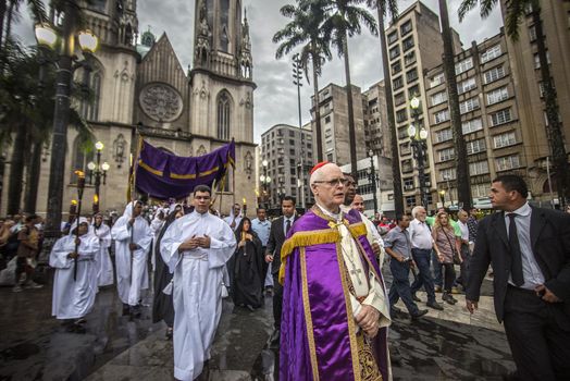 BRAZIL, Sao Paulo: Penitents participate in a Good Friday procession through Sao Paulo, Brazil on March 25, 2016.Good Friday is the Friday before Easter, which symbolizes the day that Jesus Christ was crucified and died. 