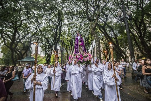 BRAZIL, Sao Paulo: Worshippers carry a statue of The Virgin Mary, as part of a Good Friday procession through Sao Paulo, Brazil on March 25, 2016.Good Friday is the Friday before Easter, which symbolizes the day that Jesus Christ was crucified and died. 
