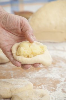 Several small patties with the potato filling