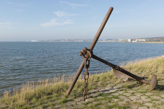Old rusted anchor on the island Terschelling in the Netherlands
