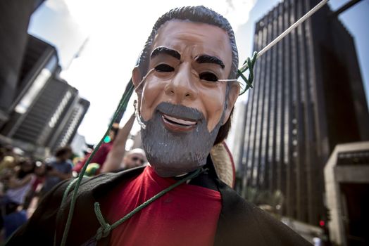 BRAZIL, Sao Paulo: A picture is taken of an effigie of  Brazilian former president (2003-2011) Luiz Inacio Lula da Silva known as Lula during a protest for the impeachment of President Dilma Rousseff, against former president Lula and against corruption in Petrobras scandal case in Sao Paulo, Brazil on March 26, 2016. Brazilian lawmakers relaunched impeachment proceedings against President Dilma Rousseff Thursday and a judge blocked her bid to bring her powerful predecessor into her cabinet, intensifying the political crisis engulfing her. 