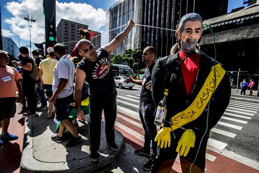 BRAZIL, Sao Paulo: A picture is taken of an effigie of  Brazilian former president (2003-2011) Luiz Inacio Lula da Silva known as Lula during a protest for the impeachment of President Dilma Rousseff, against former president Lula and against corruption in Petrobras scandal case in Sao Paulo, Brazil on March 26, 2016. Brazilian lawmakers relaunched impeachment proceedings against President Dilma Rousseff Thursday and a judge blocked her bid to bring her powerful predecessor into her cabinet, intensifying the political crisis engulfing her. 