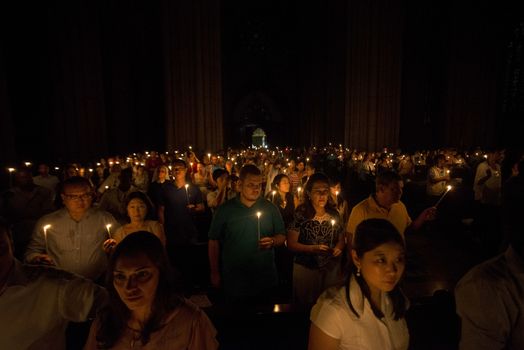 BRAZIL, Sao Paulo: Churchgoers attend Easter mass and vigil at São Paulo See Metropolitan Cathedral on March 26, 2016. Christians around the world are marking the Holy Week, commemorating the crucifixion of Jesus Christ, leading up to his resurrection on Easter.