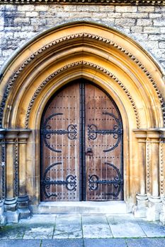 Old massive church door with arch