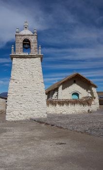 Historic church in the small village of Guallatire on the Altiplano in the Arica y Parinacota Region of Chile. The village sits at the base of the active Guallatire Volcano.