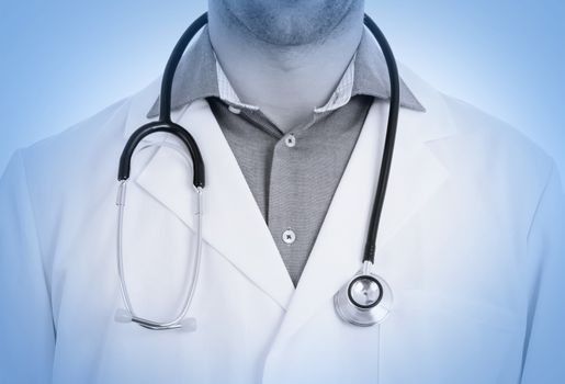 Close up of male doctor with stethoscope, isolated, medical blue