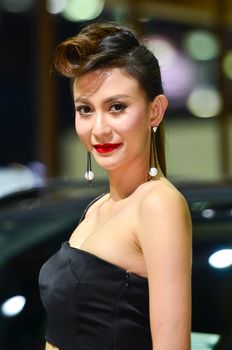 NONTHABURI - MARCH 26 : Unidentified model with Volvo car on display at The 37th Bangkok International Thailand Motor Show 2016 on March 26, 2016 Nonthaburi, Thailand.