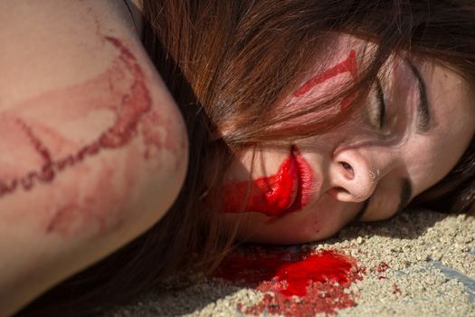 SPAIN, Madrid: Anti-bullfighting protesters covered with red paint as if it is blood gather at Puerta del Sol square, in Madrid, on March 27, 2016 against bullfights. They have turned the iconic square of Puerta del Sol into a bullring. Protesters deman
