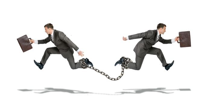 Two businessmen with chain running in different ways isolated on white background