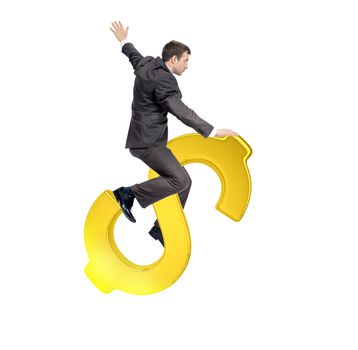 Businessman riding golden dollar sign isolated on white background