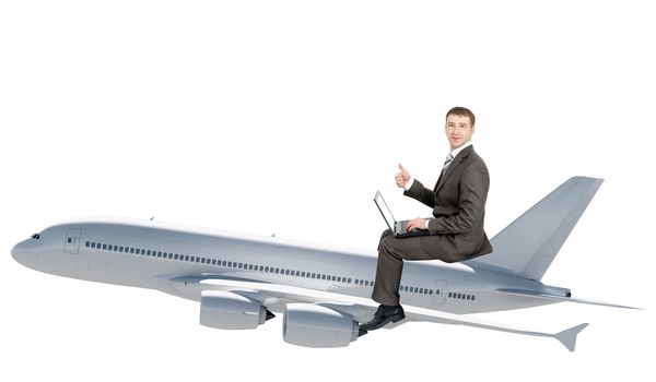 Businessman with laptop flying on jet isolated on white background