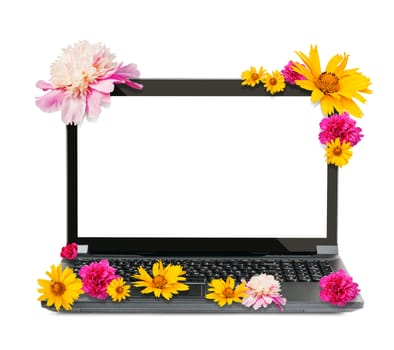 Laptop with flowers isolated on white background