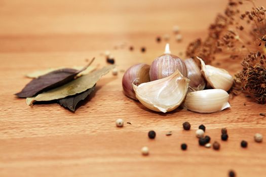 Bay leaves, pepper, dill, garlic - Ingredients for pickling
