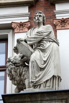 Saint Mark the Evangelist on the facade of Evangelical School in Vienna, Austria