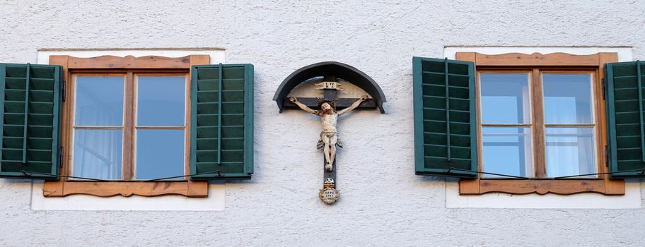 Crucifixion on house facade in St. Wolfgang on Wolfgangsee in Austria