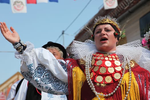 Croatian national costume from the village Habjanovci, during the Dakovacki vezovi (Dakovo Summer Festival) on July 05, 2009 in Dakovo, Croatia.