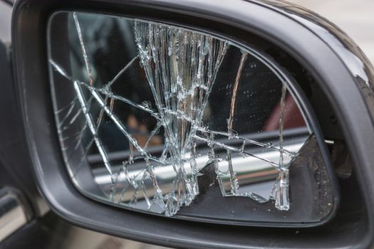 Damaged broken car mirrors