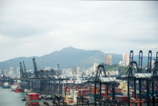 Hong Kong International Terminal Harbour,Large port crane and cityscape in Hong Kong harbour , Hong Kong