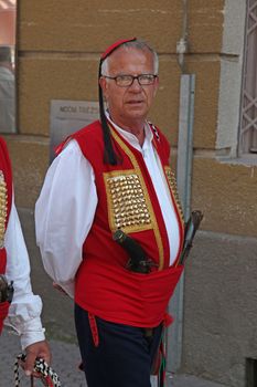 Croatian national costume from the town of Sinj, during the Dakovacki vezovi (Dakovo Summer Festival) on July 05, 2009 in Dakovo, Croatia.