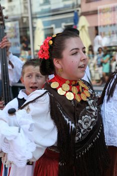 Croatian national costume from the village Trnava, during the Dakovacki vezovi (Dakovo Summer Festival) on July 05, 2009 in Dakovo, Croatia.