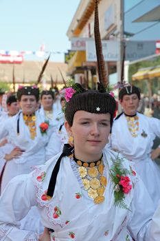 Croatian national costume from the village Gudinci, during the Dakovacki vezovi (Dakovo Summer Festival) on July 05, 2009 in Dakovo, Croatia.