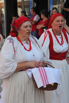 Croatian national costume from the village Mala Mlaka, during the Dakovacki vezovi (Dakovo Summer Festival) on July 05, 2009 in Dakovo, Croatia.