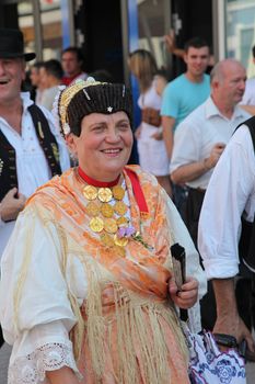 Croatian national costume from the village Mala Mlaka, during the Dakovacki vezovi (Dakovo Summer Festival) on July 05, 2009 in Dakovo, Croatia.