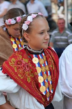 Croatian national costume from the village Mala Mlaka, during the Dakovacki vezovi (Dakovo Summer Festival) on July 05, 2009 in Dakovo, Croatia.