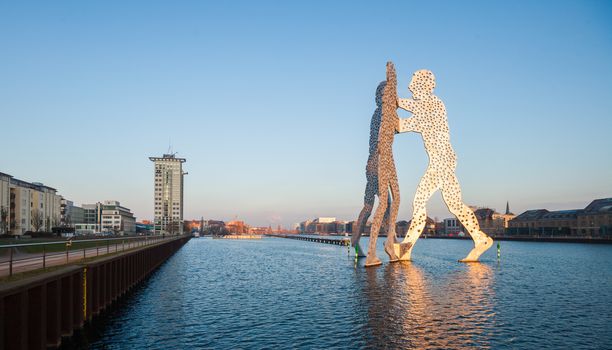 River Spree and Molecule Man / Men statue, Berlin