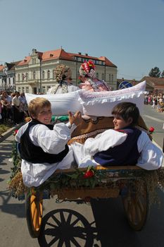 Croatian national costume at the horse and wedding wagon show during Dakovo vezovi (Dakovo Summer Festival) on July 05, 2009 in Dakovo, Croatia.