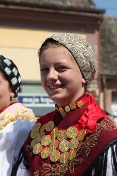 Croatian national costume at the horse and wedding wagon show during Dakovo vezovi (Dakovo Summer Festival) on July 05, 2009 in Dakovo, Croatia.