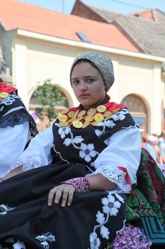 Croatian national costume at the horse and wedding wagon show during Dakovo vezovi (Dakovo Summer Festival) on July 05, 2009 in Dakovo, Croatia.