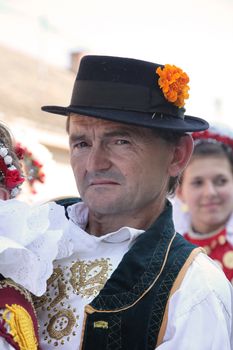 Croatian national costume at the horse and wedding wagon show during Dakovo vezovi (Dakovo Summer Festival) on July 05, 2009 in Dakovo, Croatia.