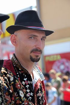 Croatian national costume at the horse and wedding wagon show during Dakovo vezovi (Dakovo Summer Festival) on July 05, 2009 in Dakovo, Croatia.