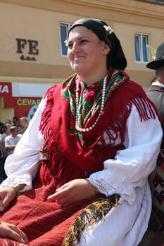 Croatian national costume at the horse and wedding wagon show during Dakovo vezovi (Dakovo Summer Festival) on July 05, 2009 in Dakovo, Croatia.