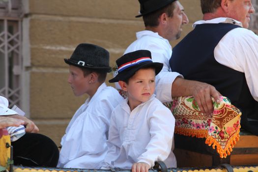 Croatian national costume at the horse and wedding wagon show during Dakovo vezovi (Dakovo Summer Festival) on July 05, 2009 in Dakovo, Croatia.