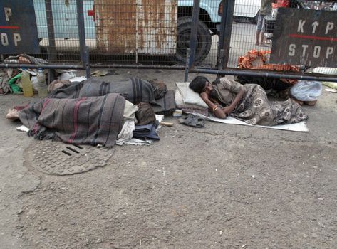 Homeless people sleeping on the footpath of Kolkata.