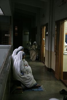 Sisters of The Missionaries of Charity of Mother Teresa at Mass in the chapel of the Mother House, Kolkata, India