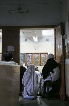 Sisters of The Missionaries of Charity of Mother Teresa at Mass in the chapel of the Mother House, Kolkata, India
