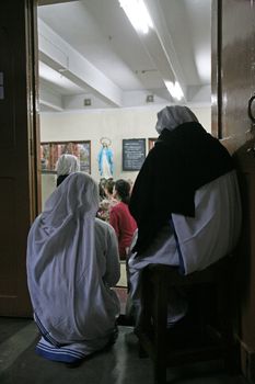 Sisters of The Missionaries of Charity of Mother Teresa at Mass in the chapel of the Mother House, Kolkata, India