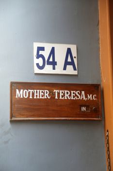 Sign on the entrance to Mother House, the residence of Mother Teresa in Kolkata, West Bengal, India