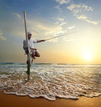 Local fisherman on stick on a beach of Indian ocean, Sri Lanka