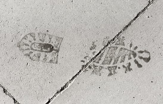 Footstep Imprint on Pavement