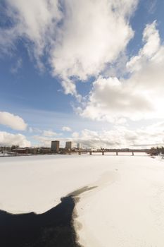 Downtown Umeå, Sweden and its river in winter.