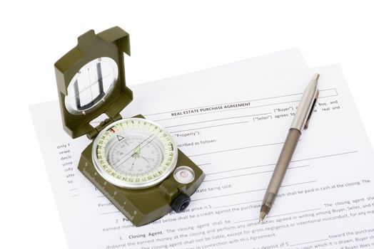 Documents with compass and pen on isolated white background, closeup